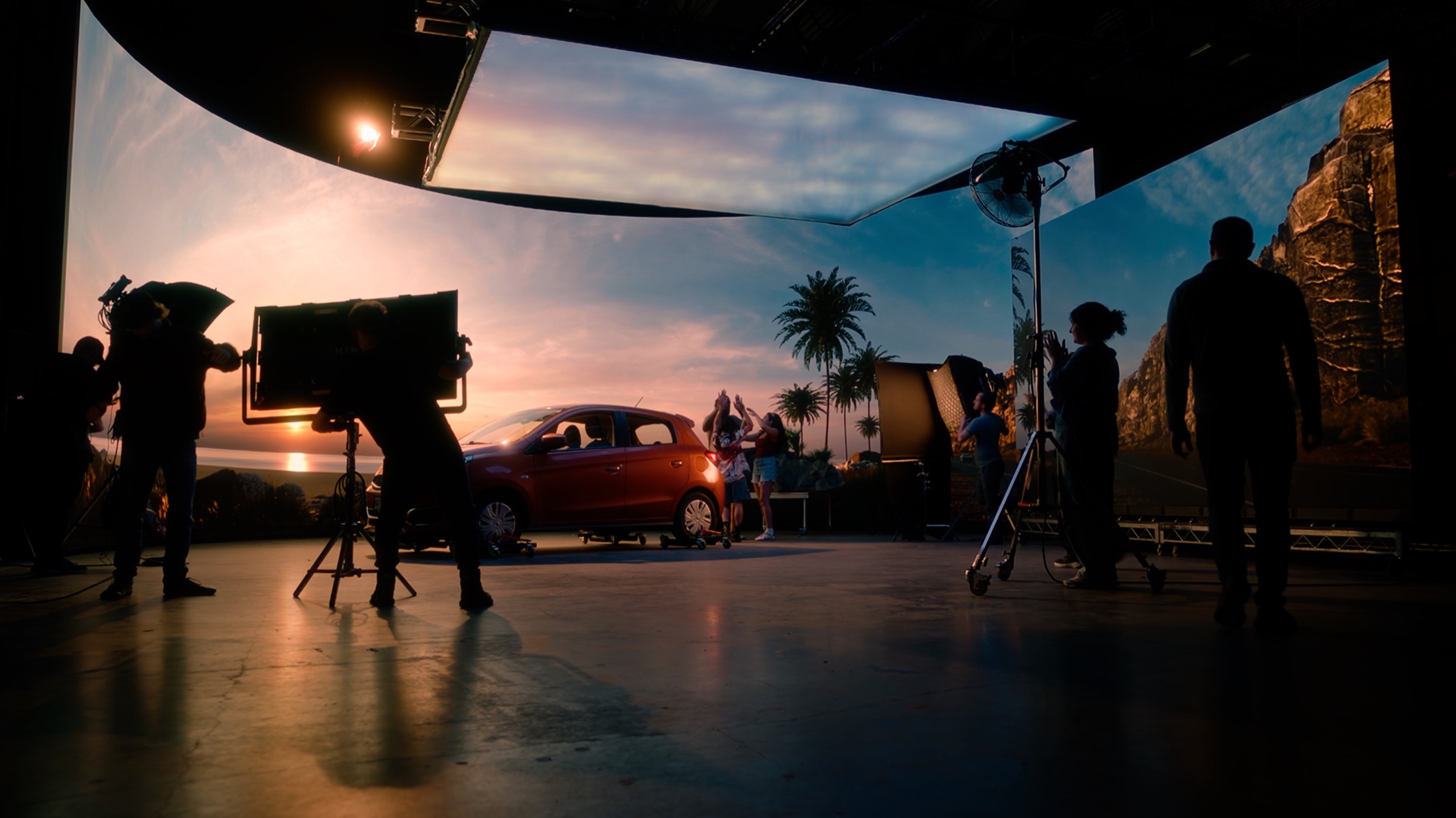 Crew filming a car on the Lumostage LED volume for the Road Trip production